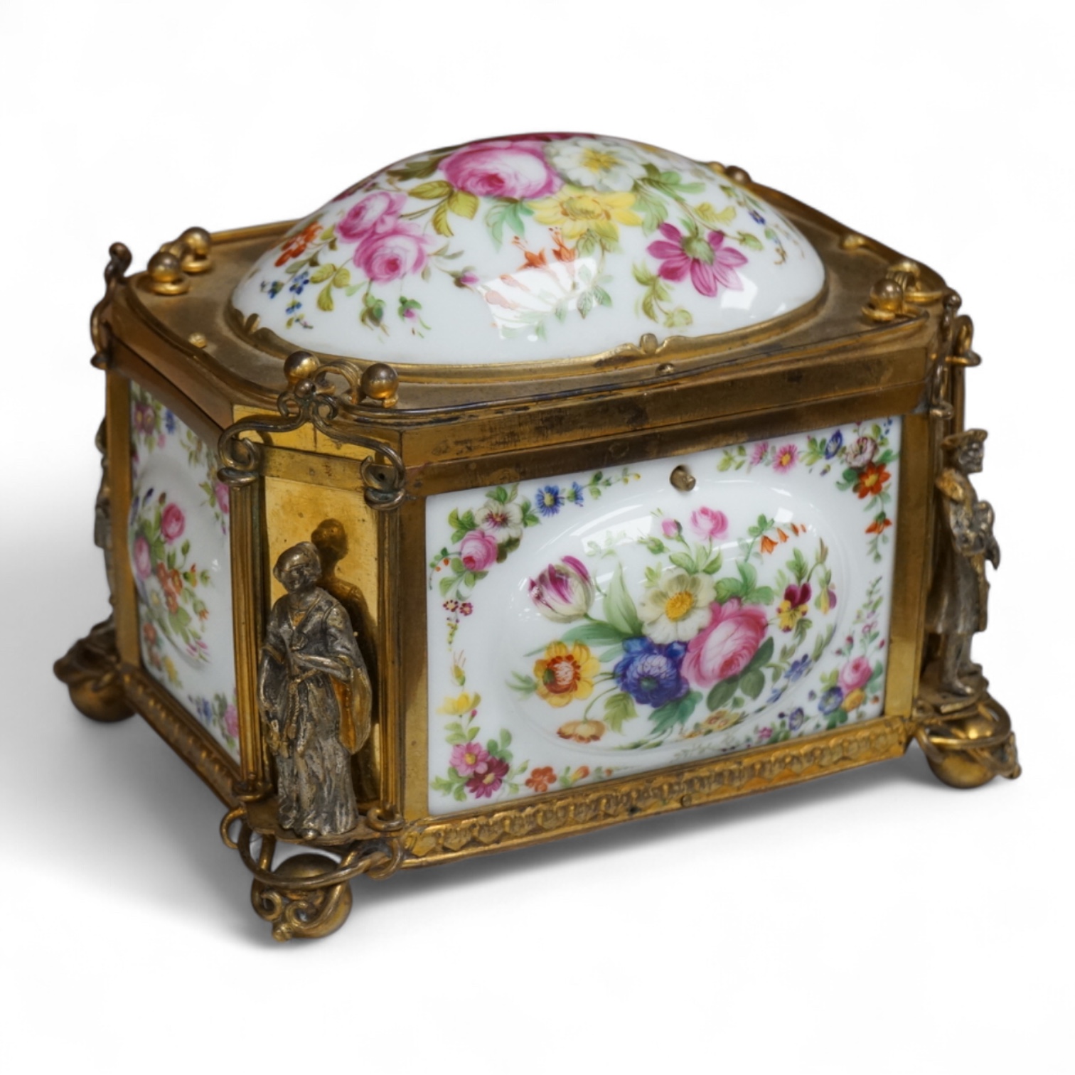 A gilt-brass figural and floral porcelain jewellery casket, 14cm wide, 11cm high.